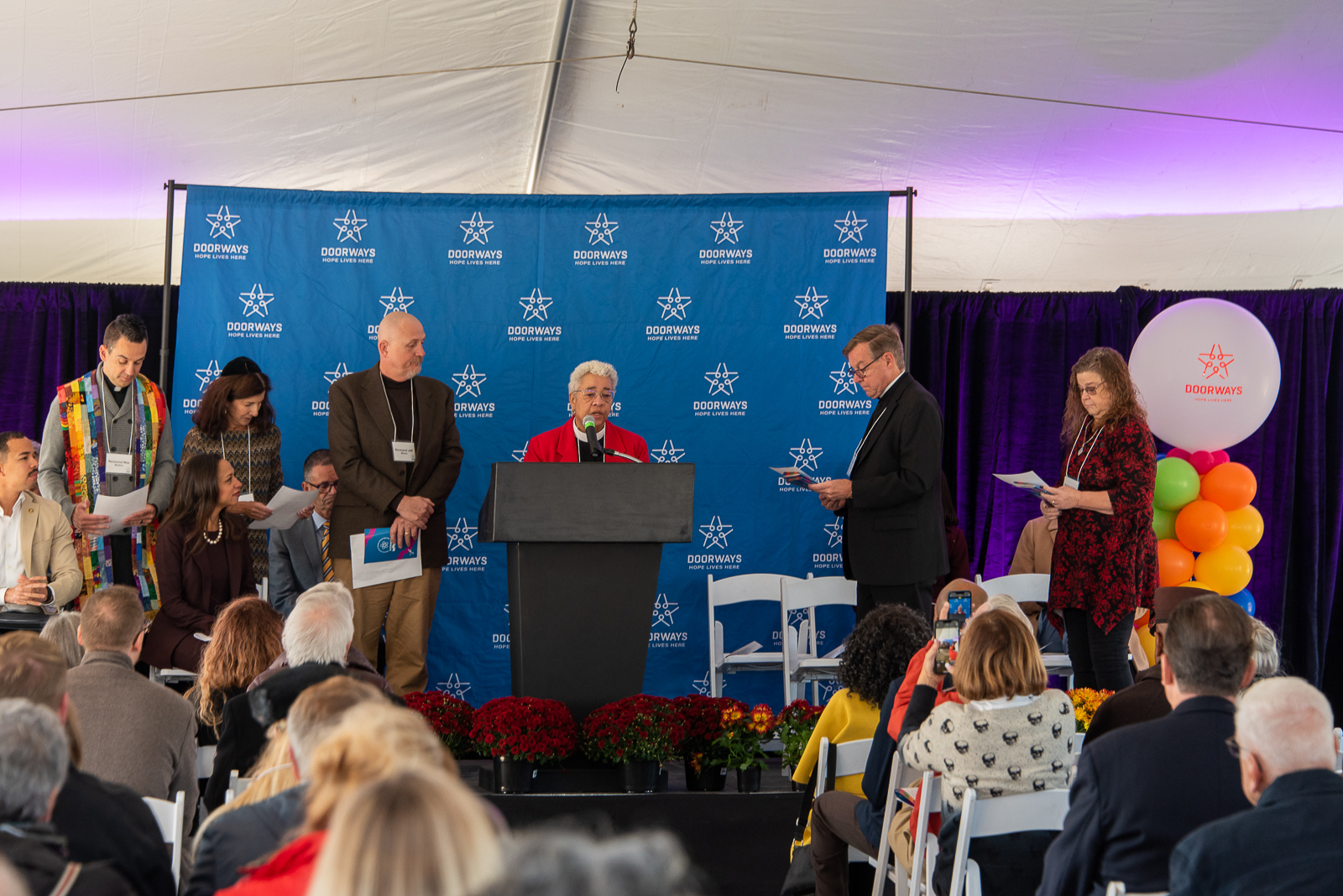 As part of the DOORWAYS heritage, the event began with an interfaith blessing.